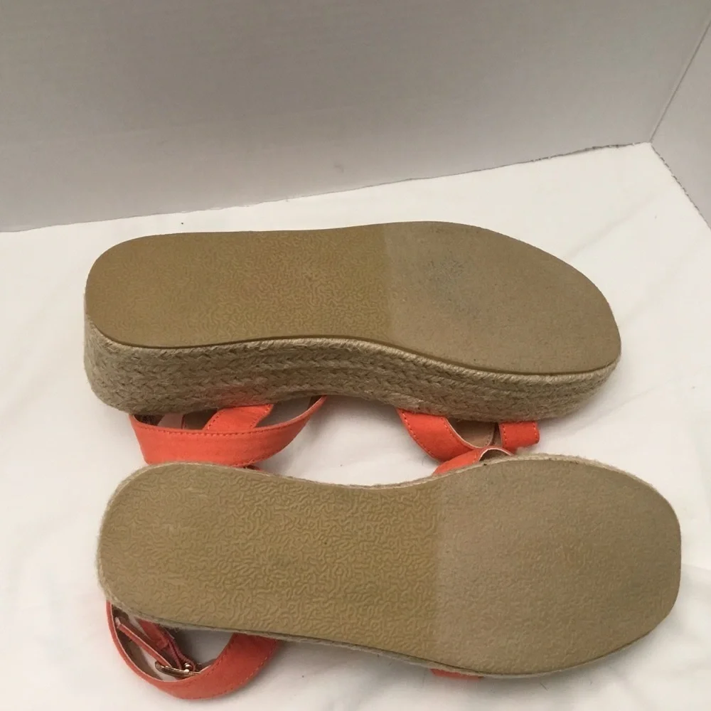 Lulu's strappy orange slippers